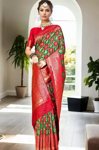 Green woven design zari silk blend kanjeevaram saree
