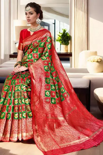 Green woven design zari silk blend kanjeevaram saree