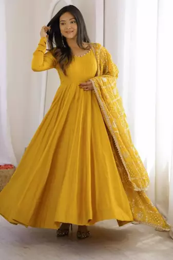 Yellow chanderi embroidered flared gown set