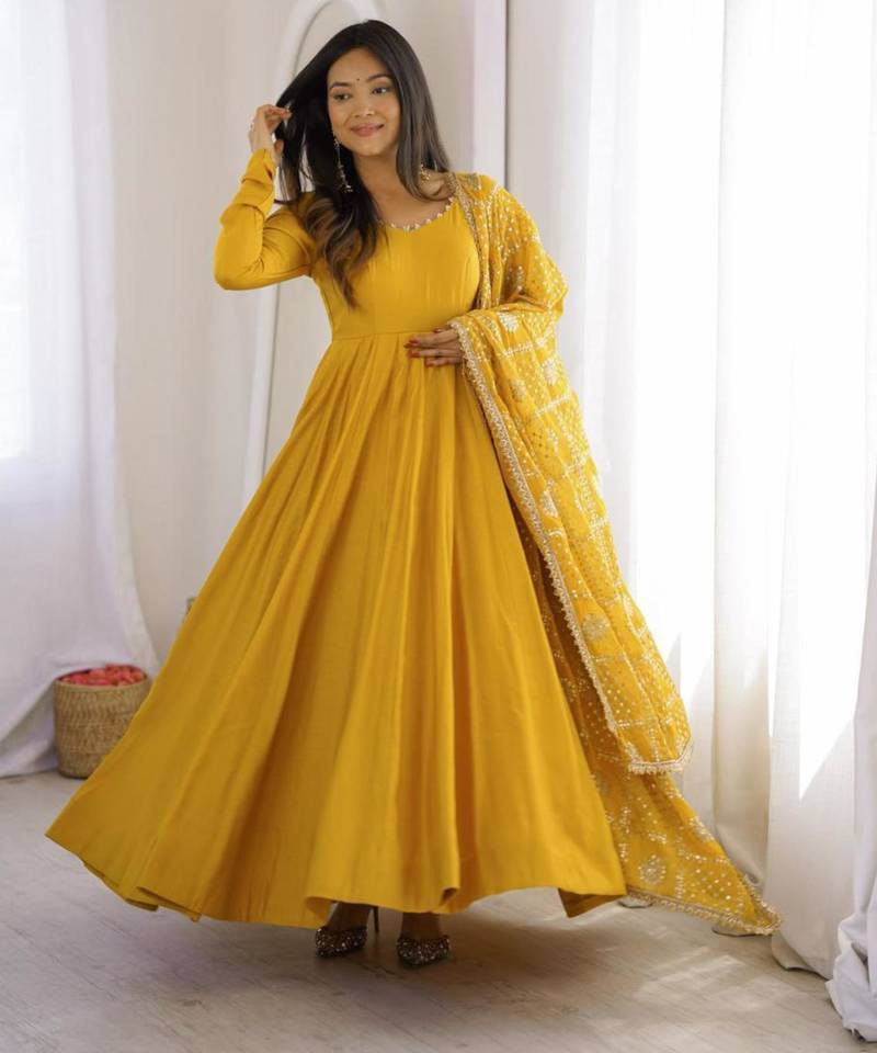 Yellow chanderi embroidered flared gown set