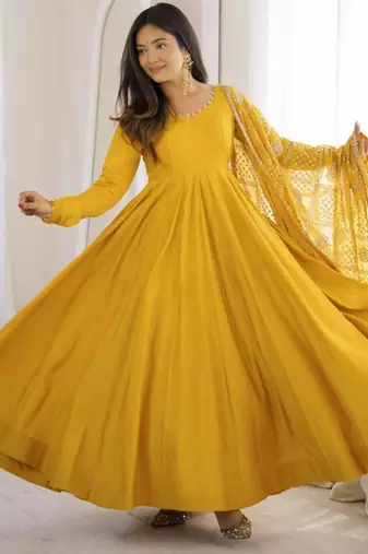 Yellow chanderi embroidered flared gown set