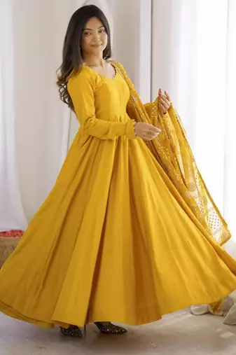 Yellow chanderi embroidered flared gown set