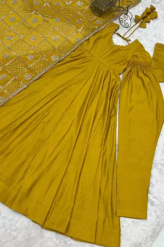 Yellow chanderi embroidered flared gown set