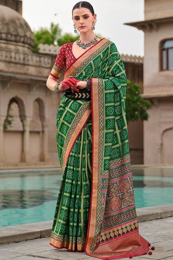 Green bandhani woven design zari  bandhani celebrity saree