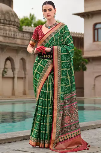 Green bandhani woven design zari  bandhani celebrity saree