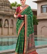 Green bandhani woven design zari  bandhani celebrity saree