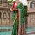 Green bandhani woven design zari  bandhani celebrity saree