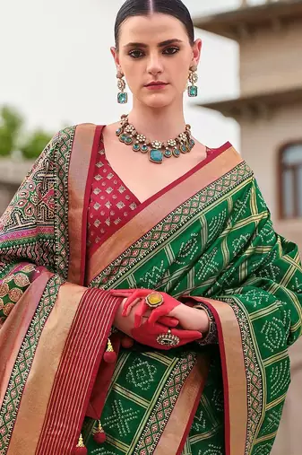 Green bandhani woven design zari  bandhani celebrity saree