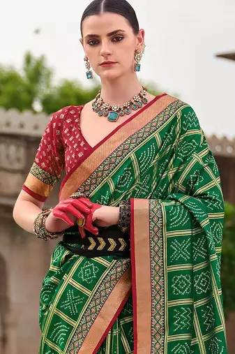 Green bandhani woven design zari  bandhani celebrity saree