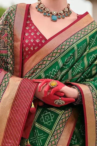 Green bandhani woven design zari  bandhani celebrity saree