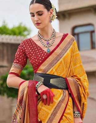 Yellow woven design zari silk blend bandhani saree 2