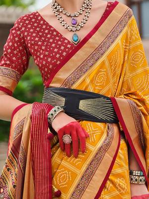 Yellow woven design zari silk blend bandhani saree 4
