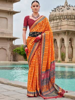 Orange bandhani zari silk blend bandhani saree 1