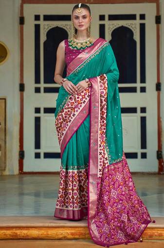 Sea green embellished pochampally saree