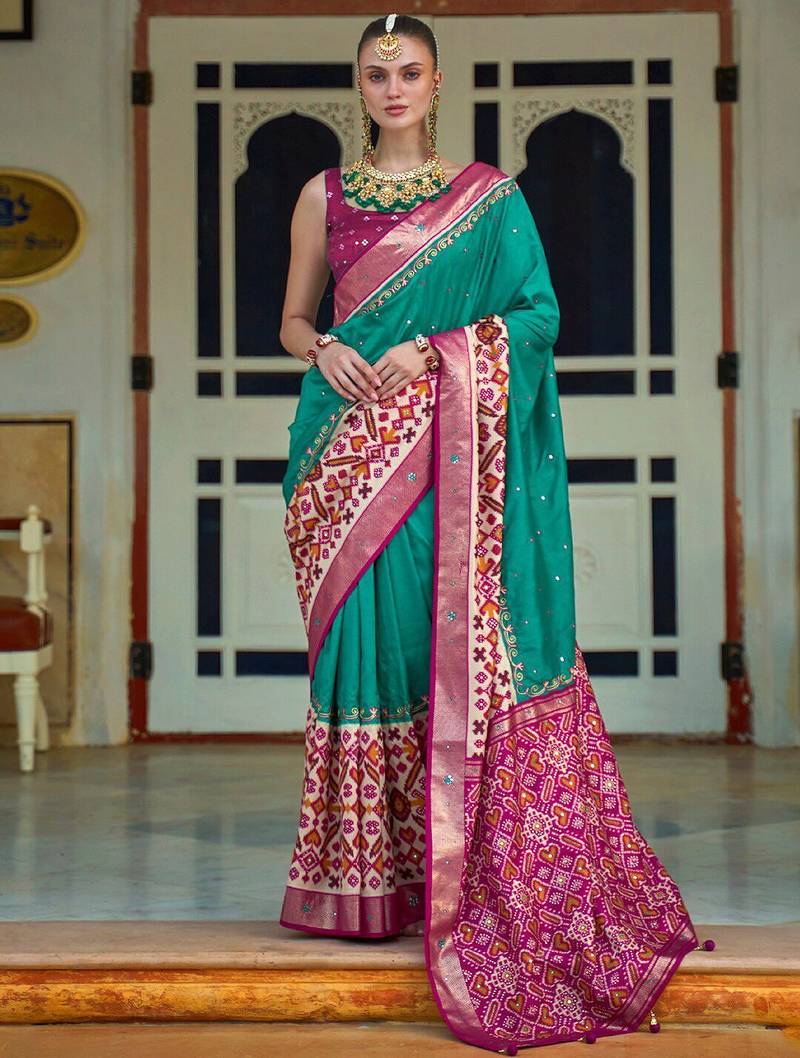 Sea green embellished pochampally saree