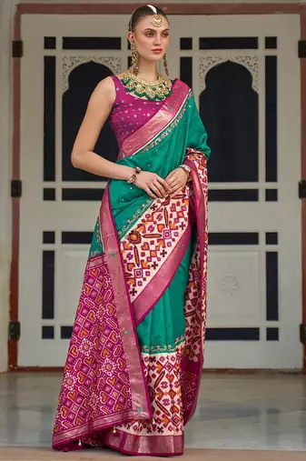 Sea green embellished pochampally saree