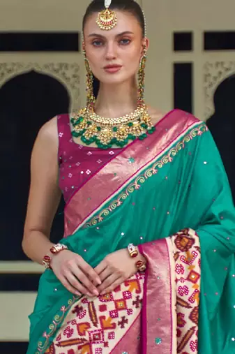 Sea green embellished pochampally saree