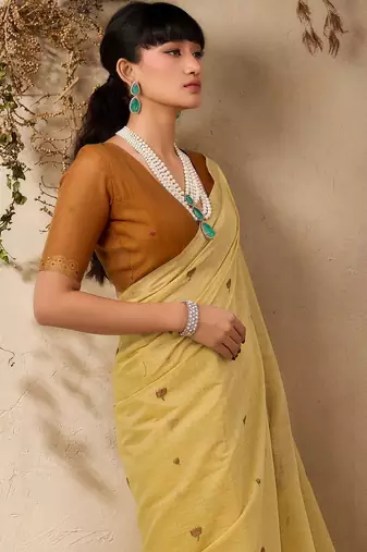 yellow ethnic motifs cotton blend muga saree