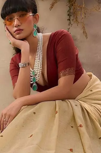 beige ethnic motifs cotton blend muga saree