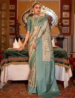 beige woven design zari kanjeevaram silk blend saree 1