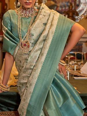 beige woven design zari kanjeevaram silk blend saree 4