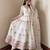 White silk blend embroidered flared gown set