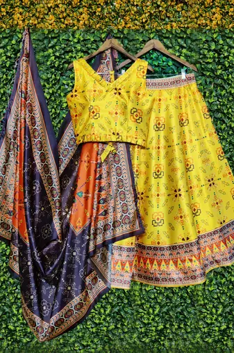 yellow satin lehenga with printed work and silk dupatta