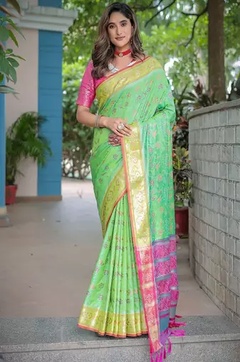 green woven design floral zari kanjeevaram silk blend saree