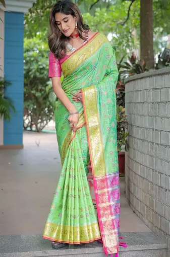 green woven design floral zari kanjeevaram silk blend saree