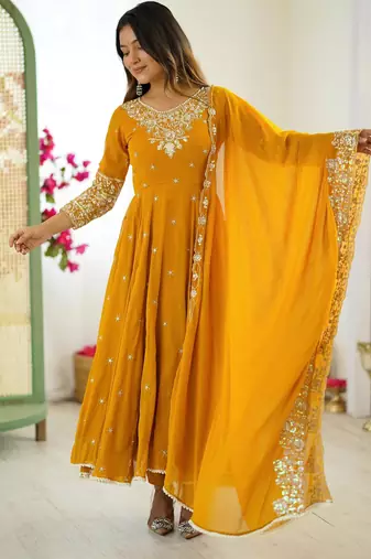 Yellow faux georgette embroidered flared gown set