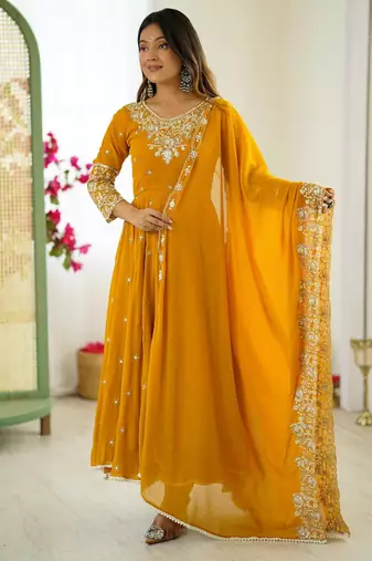 Yellow faux georgette embroidered flared gown set