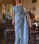 blue floral printed zari bagru saree with matching blouse