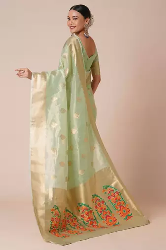 Sea green ethnic motifs woven design zari tissue banarasi saree