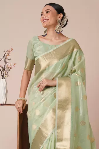 Sea green ethnic motifs woven design zari tissue banarasi saree