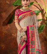 Beige ethnic motifs silk blend saree