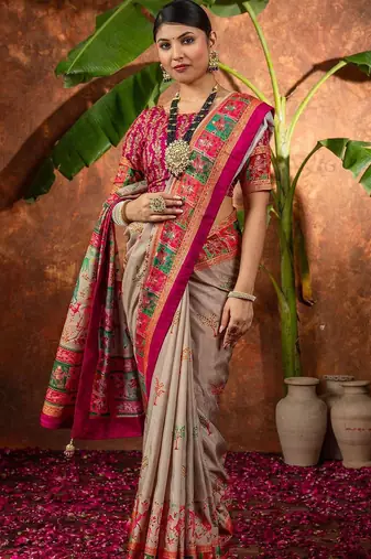 Beige ethnic motifs silk blend saree