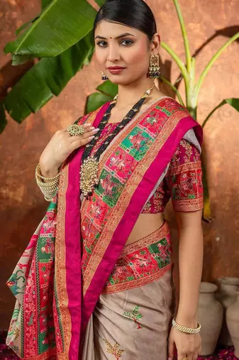 Beige ethnic motifs silk blend saree