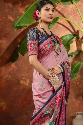 Mauve ethnic motifs silk blend saree