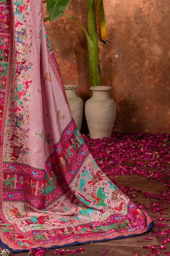 Mauve ethnic motifs silk blend saree