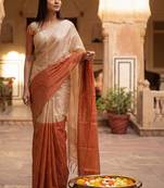 Beige woven design tissue handloom kasavu saree