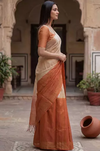 Beige woven design tissue handloom kasavu saree