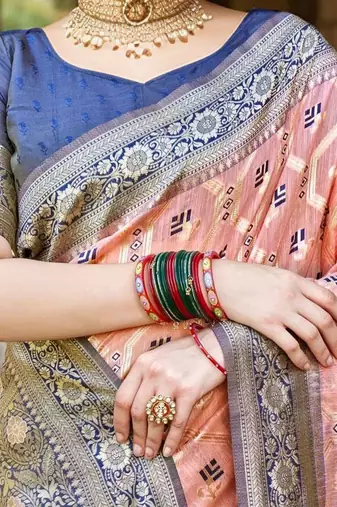 peach woven design linen saree with unstitched blosue piece