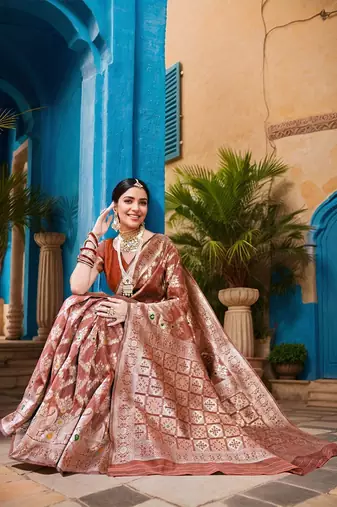 rust floral woven banarasi silk blend saree