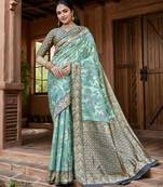 blue ethnic motifs printed woven design linen saree