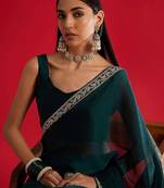 teal embellished zari satin designer saree