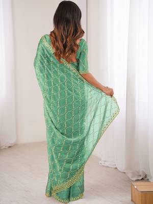 sea green teal green chiffon ethnic embellished party wear matching blouse sarees 3