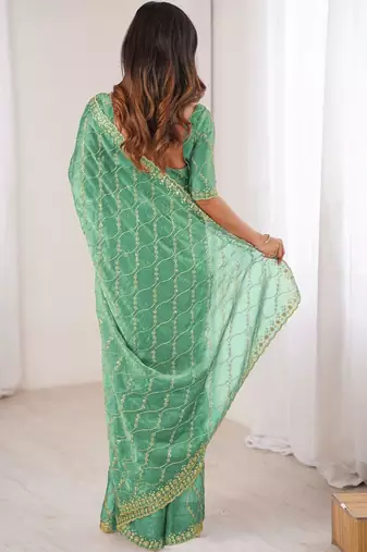 sea green teal green chiffon ethnic embellished party wear matching blouse sarees