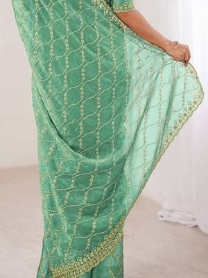 sea green teal green chiffon ethnic embellished party wear matching blouse sarees 5