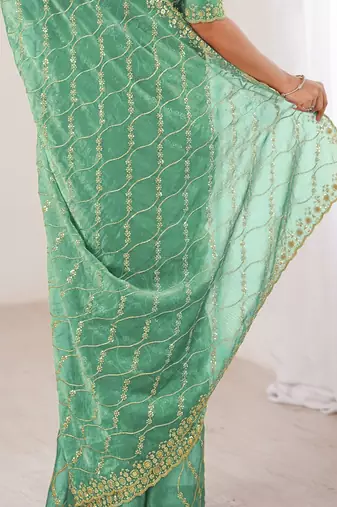 sea green teal green chiffon ethnic embellished party wear matching blouse sarees