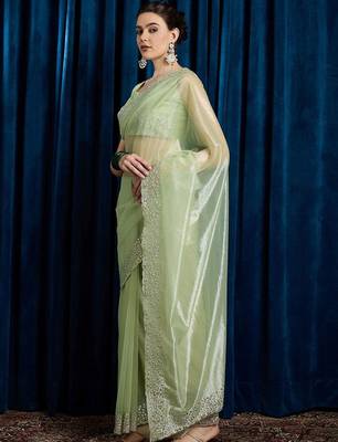 green embellished beads and stones net saree 2